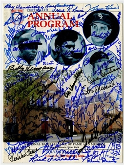 1985 Signed Baseball Hall of Fame Program (64) Signatures Including Hunter, DiMaggio, Gomez, Mantle,Koufax and Ted Williams
